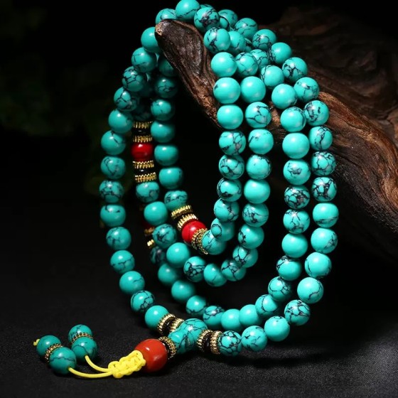 Tibetan Buddhist prayer beads and turquoise bracelet